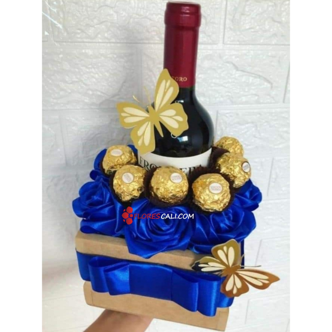 Cubo de rosas azules para el flores cali