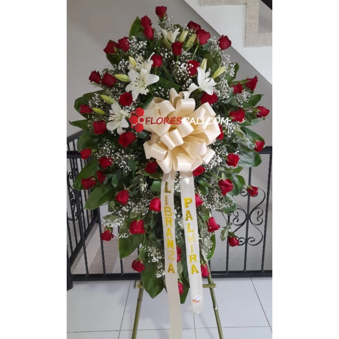 Corona funebre rosa roja y lirios en cali