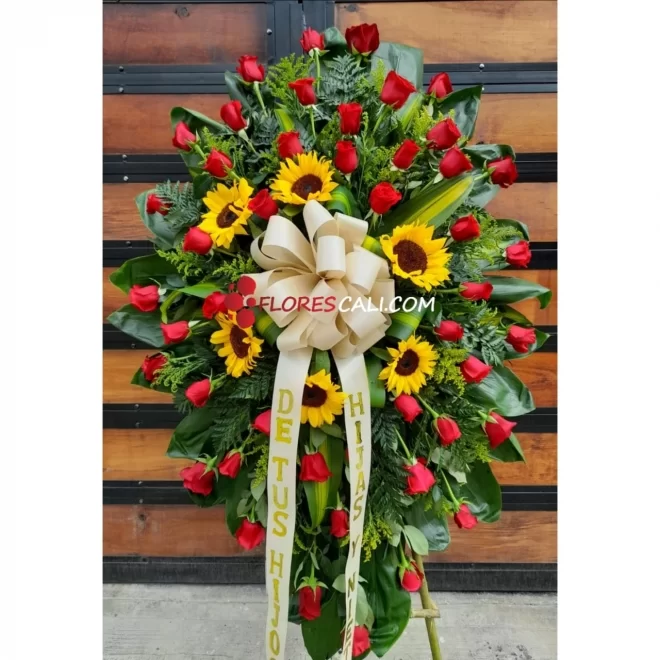 Corona fúnebre rosas y girasoles en cali