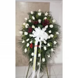Corona fúnebre rosas y lirios en cali